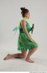 KATERINA KNNELING POSE WITH SWORD